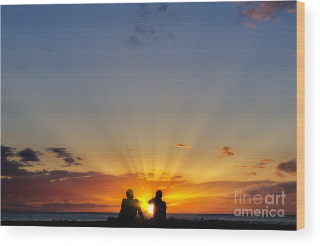 Hawaii Wood Print featuring the photograph Couple watching the sunset on a beach in Maui Hawaii USA #12 by Don Landwehrle