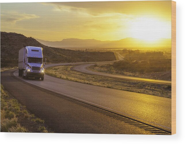 Scenics Wood Print featuring the photograph 18-wheeler Tractor-trailer Truck On Interstate Highway At Sunset by Dszc