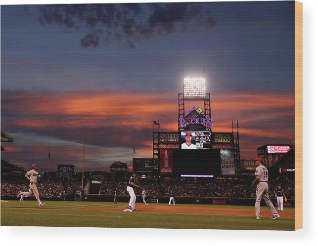 American League Baseball Wood Print featuring the photograph Arizona Diamondbacks V Colorado Rockies by Doug Pensinger