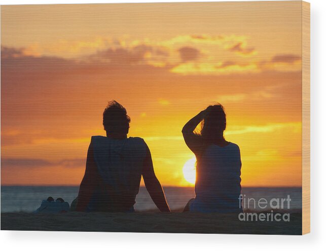 Hawaii Wood Print featuring the photograph Couple watching the sunset on a beach in Maui Hawaii USA #8 by Don Landwehrle