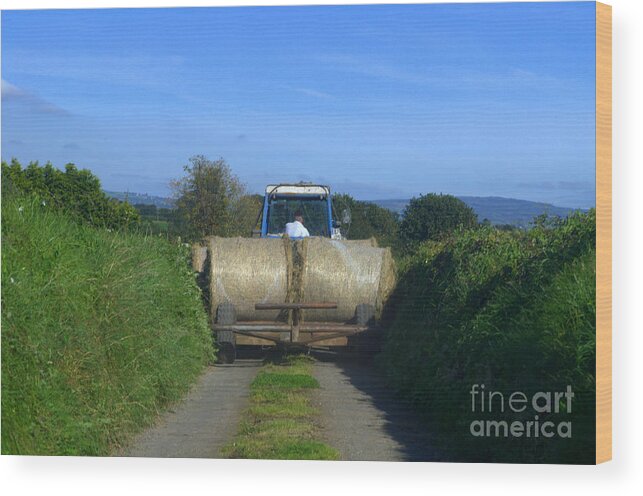 Tractor Wood Print featuring the photograph A country road by Joe Cashin