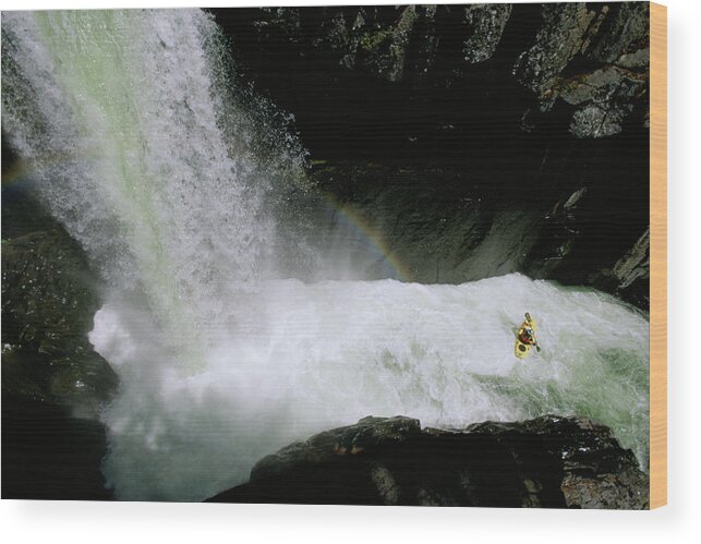 Adventure Wood Print featuring the photograph A Kayaker Exits A Narrow Passage by Charlie Munsey