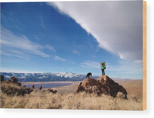 25-29 Years Wood Print featuring the photograph A Woman Hiking With Her Dog by Corey Rich