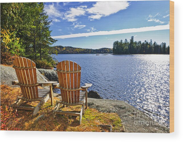 Chairs Wood Print featuring the photograph Adirondack chairs at lake shore 1 by Elena Elisseeva