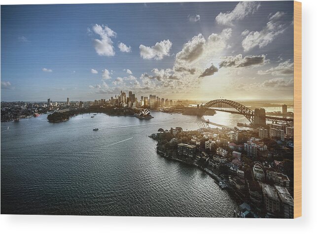 Sydney Harbor Bridge Wood Print featuring the photograph Aeriall View Of Sydney Harbour At Sunset by Howard Kingsnorth
