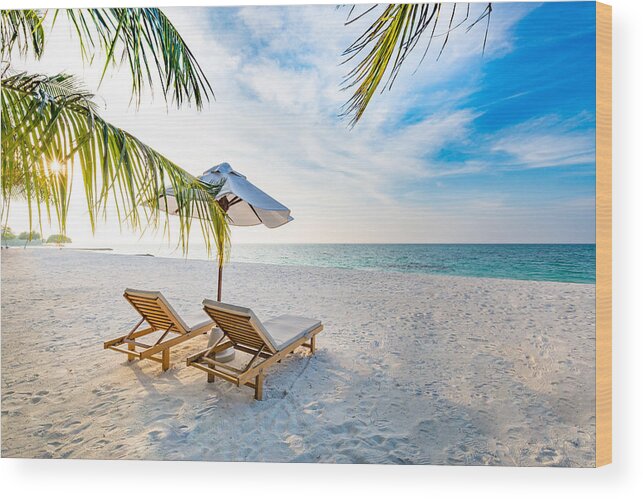 Tranquility Wood Print featuring the photograph Amazing beach sunset. Beach scene with relaxing mood. by Levente Bodo