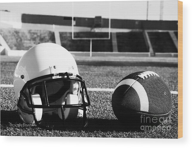 Game Wood Print featuring the photograph American Football and Helmet on Field by Danny Hooks