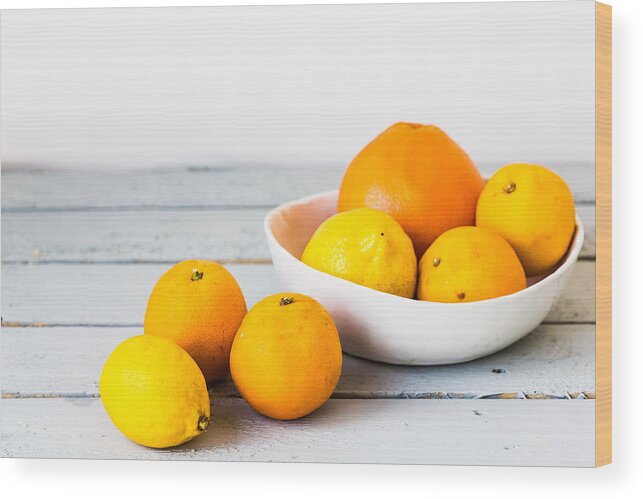 Citrus Fruit Wood Print featuring the photograph Assorted Citrus Fruits by Philippe Garo