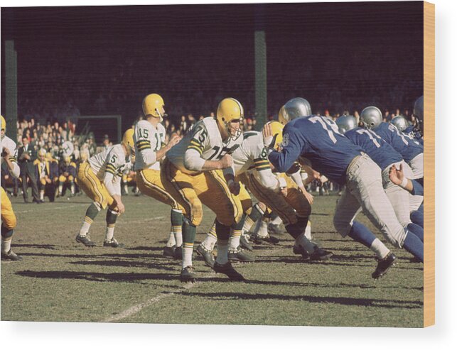 Marvin Newman Wood Print featuring the photograph Bart Starr Drops Back by Retro Images Archive