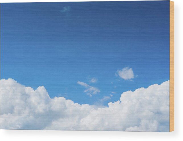 Scenics Wood Print featuring the photograph Blue Sky With Dramatic White Clouds by Primeimages