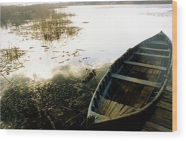 Boat Wood Print featuring the photograph Boat on shore by Emanuel Tanjala