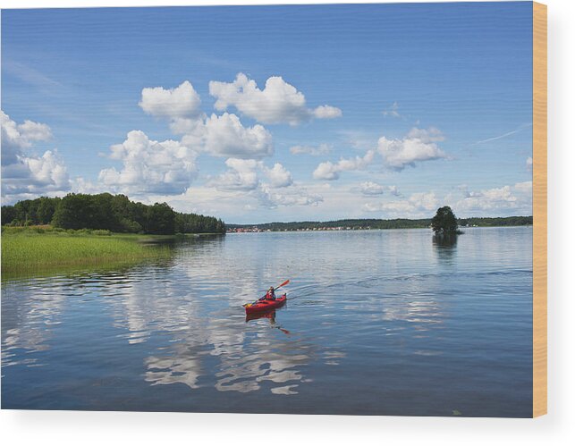 Recreational Pursuit Wood Print featuring the photograph Boy Kayaking by Johner Images