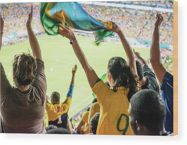 Crowd Wood Print featuring the photograph Brazilian Fan Celebrating Goal by Ramiro Olaciregui