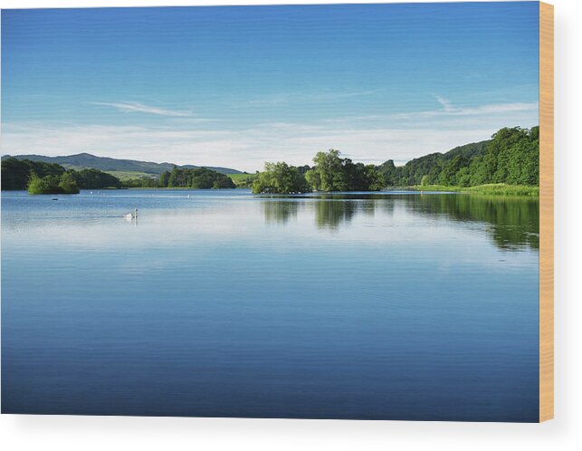 Scenics Wood Print featuring the photograph Calm Water On A Scottish Loch In Early by Johnfscott