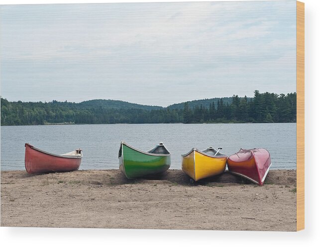 Lake Wood Print featuring the photograph Canoes on the lake by Marek Poplawski