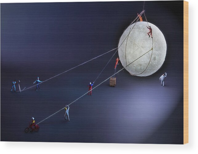 Planetary Moon Wood Print featuring the photograph Catch The Moon by Antonio Iacobelli