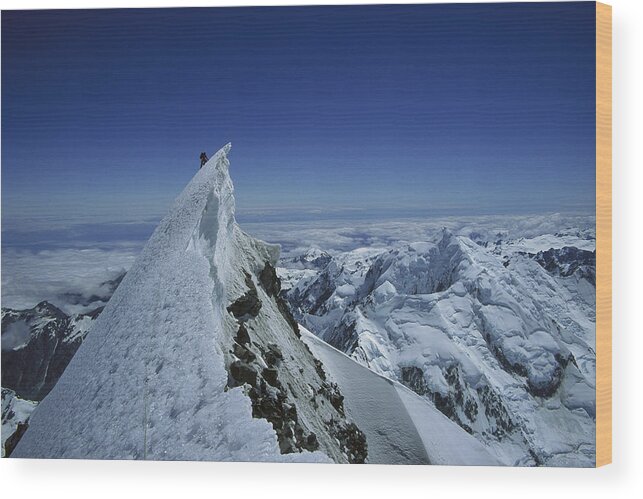Feb0514 Wood Print featuring the photograph Climber On Summit Of Mount Cook by Ned Norton