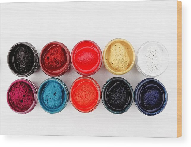 Color Wood Print featuring the photograph Colorful paint pots by Matthias Hauser