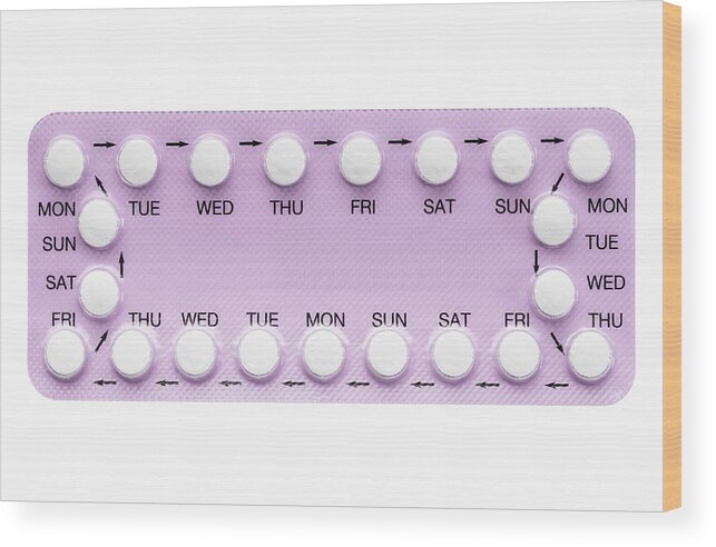 White Background Wood Print featuring the photograph Contraception pills by Creative Crop