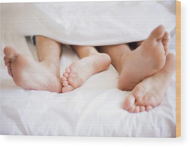 Human Wood Print featuring the photograph Couple's Feet by Ian Hooton/science Photo Library