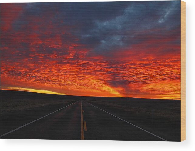 Dramatic Sunrise Wood Print featuring the photograph Dramatic sunrise by Lynn Hopwood