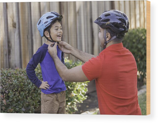 Sports Helmet Wood Print featuring the photograph Father and Son Sports Safety by JasonDoiy