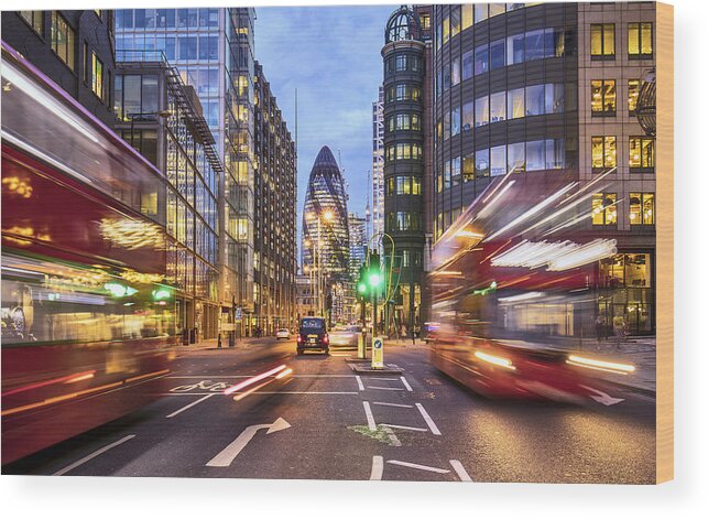 People Wood Print featuring the photograph Financial district in London at dusk by Xavierarnau