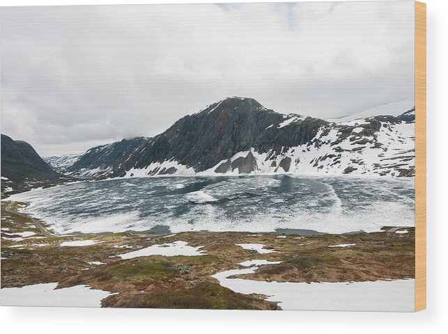 Tranquility Wood Print featuring the photograph Frozen Lake - Dalsnibba Mountains by Thierry Dosogne