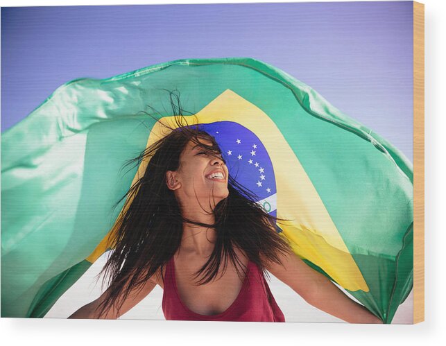 Wind Wood Print featuring the photograph Girl under brazilian flag by Wundervisuals