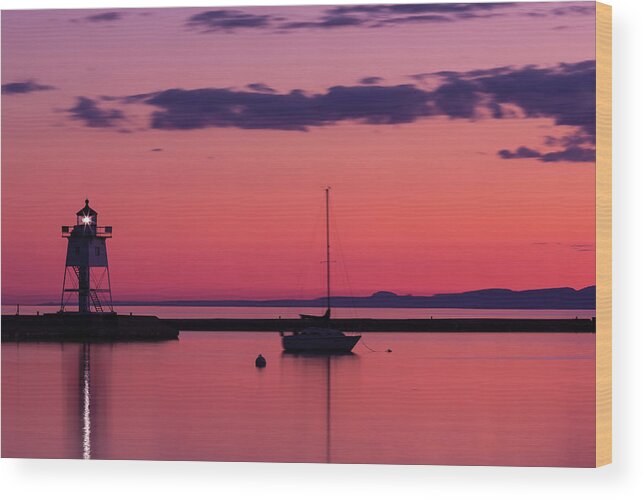 Water's Edge Wood Print featuring the photograph Grand Marais Lighthouse by John brueske