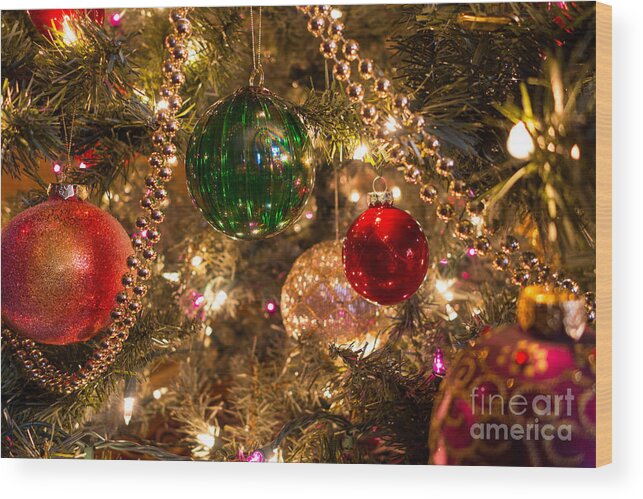 Christmas Wood Print featuring the photograph Holiday Ornaments on a Christmas tree by Amy Cicconi
