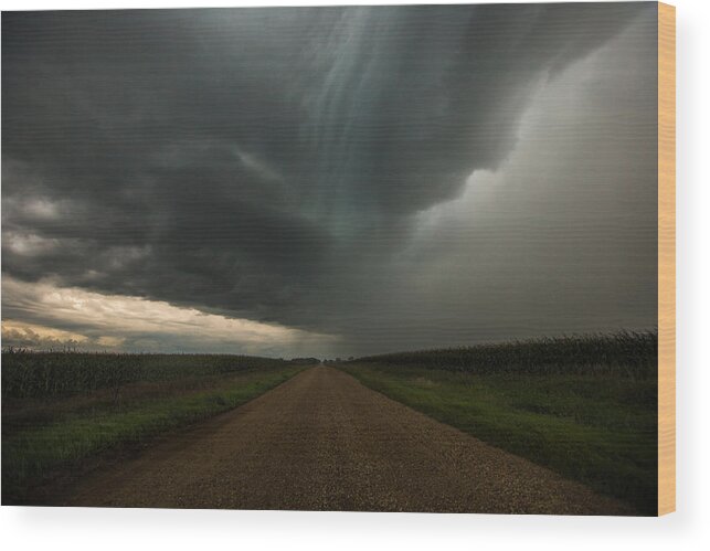 Storm Wood Print featuring the photograph It looks like rain... by Aaron J Groen