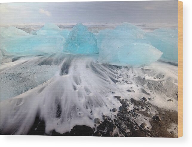 Water's Edge Wood Print featuring the photograph Jokulsarlon, Icebergs Washed Onto Shore by Travelpix Ltd