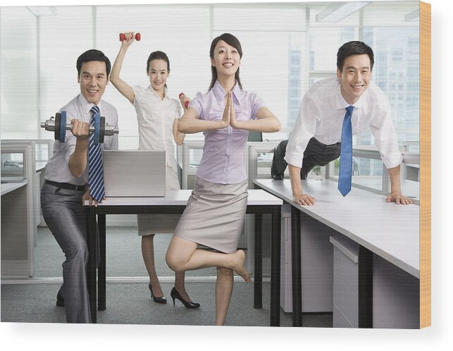 Corporate Business Wood Print featuring the photograph Keeping fit in the office by Lane Oatey