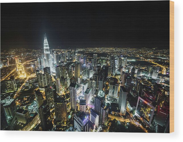 Built Structure Wood Print featuring the photograph Kualu Lumpur Skyline At Night, Elevated by Martin Puddy