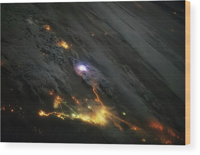 Lightning Wood Print featuring the photograph Lightning And City Lights by Nasa
