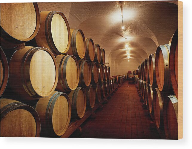 Alcohol Wood Print featuring the photograph Lots Of Future Wine Oak Barrels by Rapideye
