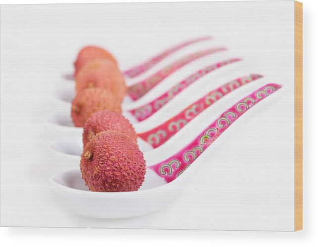 Fruit Wood Print featuring the photograph Lychees on spoons by Jane Rix