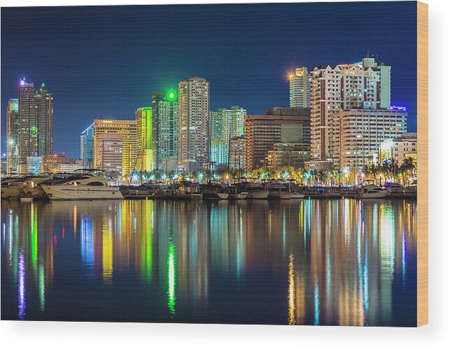 Outdoors Wood Print featuring the photograph Manila City Skyline At Night by Stuart Dee