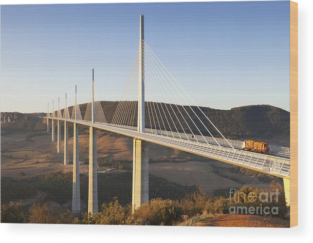 Bridge Wood Print featuring the photograph Millau Viaduct at Sunrise Midi Pyrenees France by Colin and Linda McKie