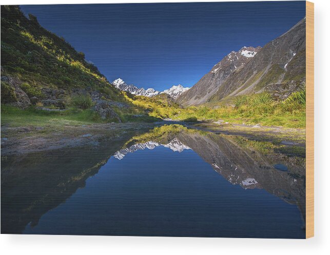 Scenics Wood Print featuring the photograph Mt.cook With Reflection by Coolbiere Photograph