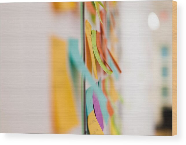 Whiteboard Wood Print featuring the photograph Multicolored sticky notes on whiteboard by Evgeny Tchebotarev
