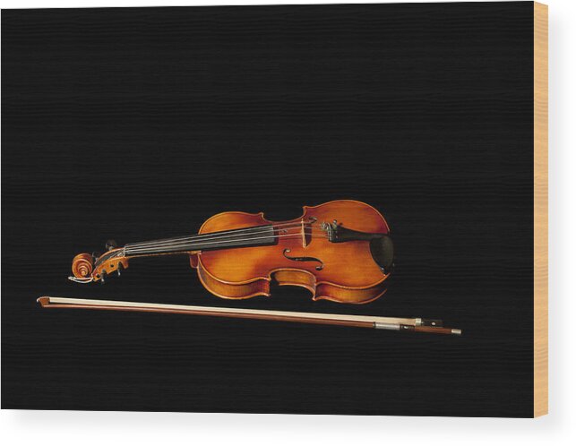Violin Wood Print featuring the photograph My old fiddle and bow by Torbjorn Swenelius