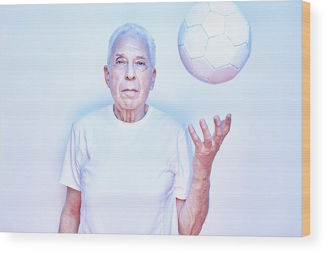 People Wood Print featuring the photograph Older Man Throwing Up Ball by Tara Moore