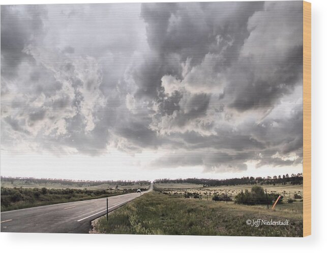 Storms Wood Print featuring the photograph Opposite the storm by Jeff Niederstadt