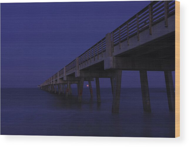 Karen Stephenson Wood Print featuring the photograph Perigee Moonrise under Pier at Jacksonville Beach by Karen Stephenson