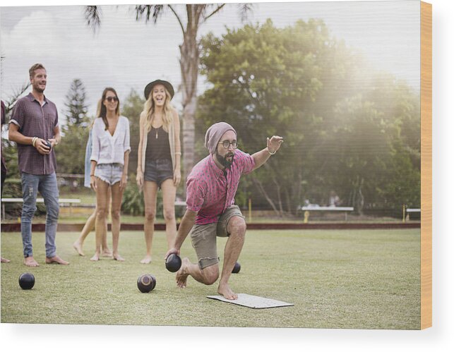 Hipster Wood Print featuring the photograph Playing Lawn Bowling by Xavierarnau