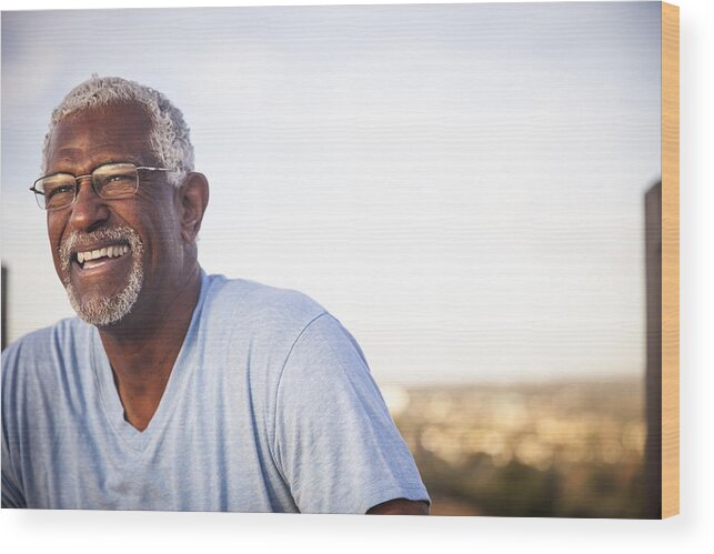 Mature Adult Wood Print featuring the photograph Portrait of a Smiling Senior Black Man by Adamkaz