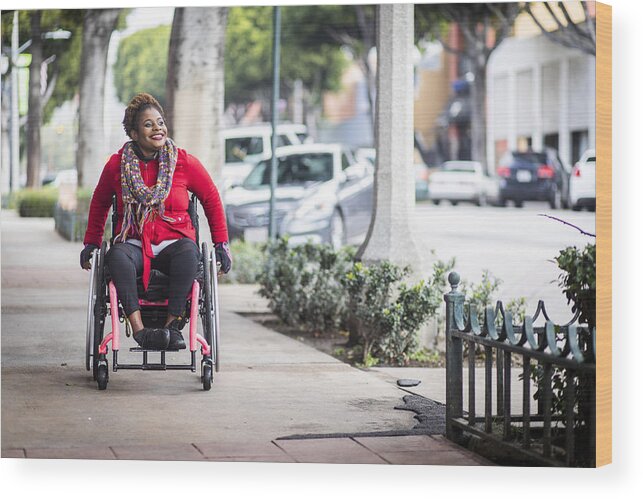 Diversity Wood Print featuring the photograph Portrait of a Young Black Woman in a Wheelchair by Adamkaz