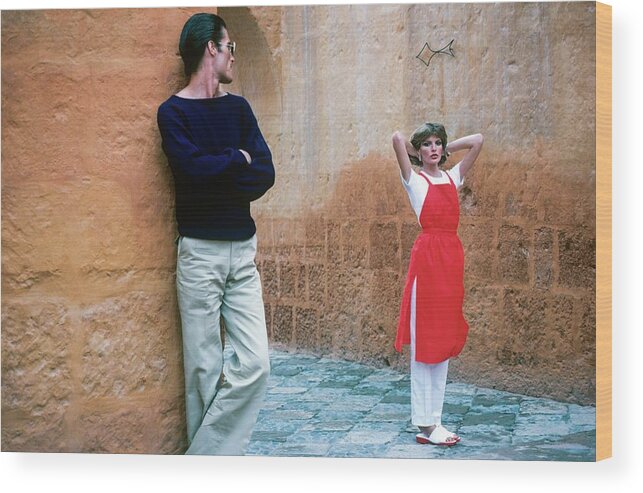 Fashion Wood Print featuring the photograph Rene Russo And A Male Model In Arequipa by Francesco Scavullo